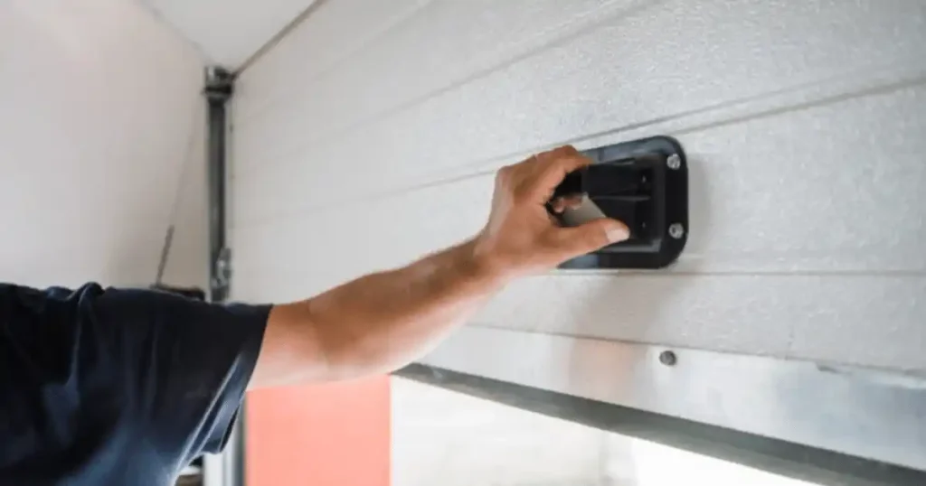 person opening garage door